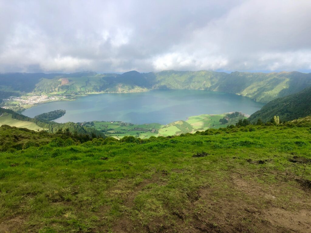 Blue crater lake in the center of the island, one of several.